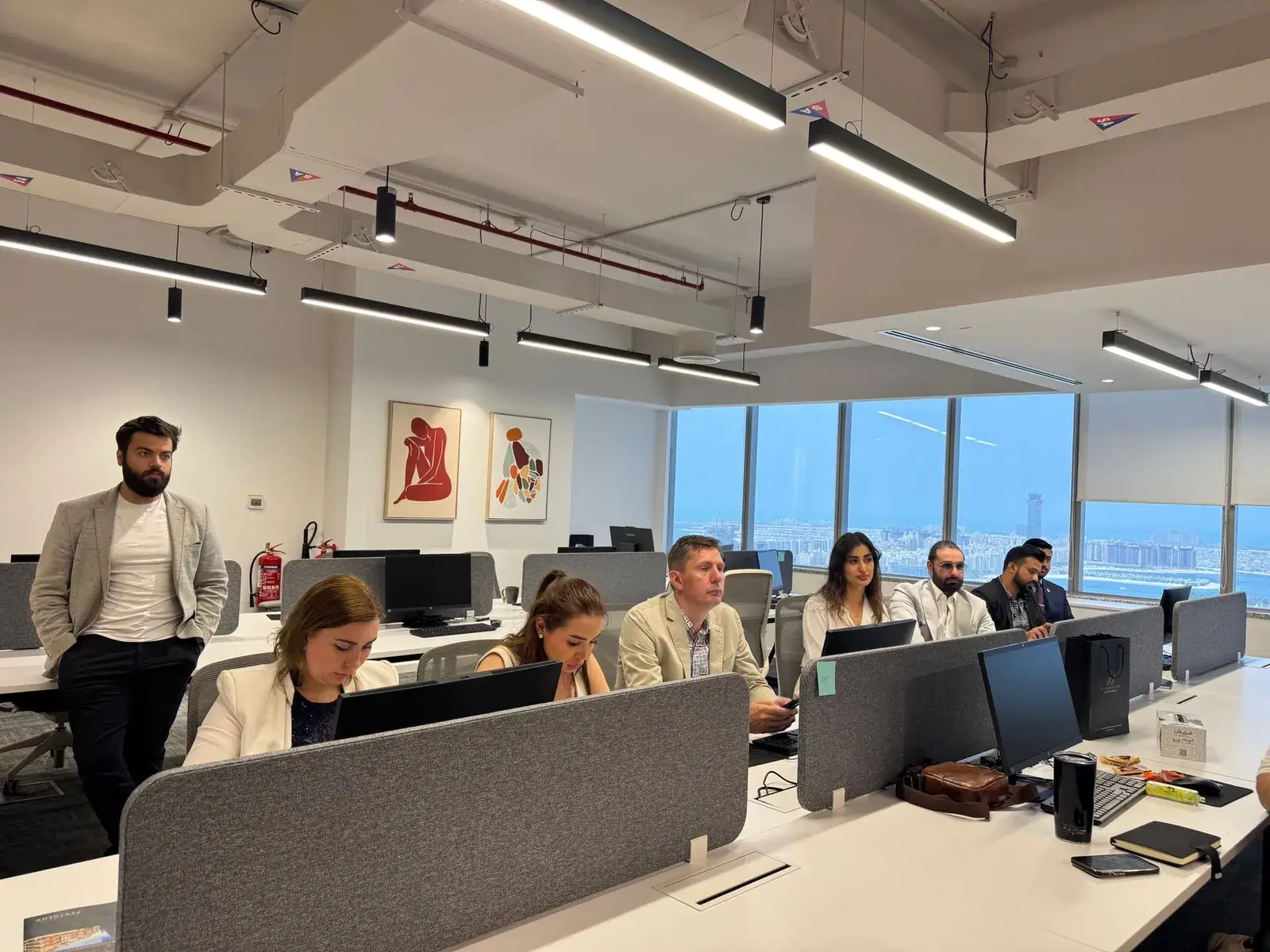 Diverse business team working in a modern Dubai office