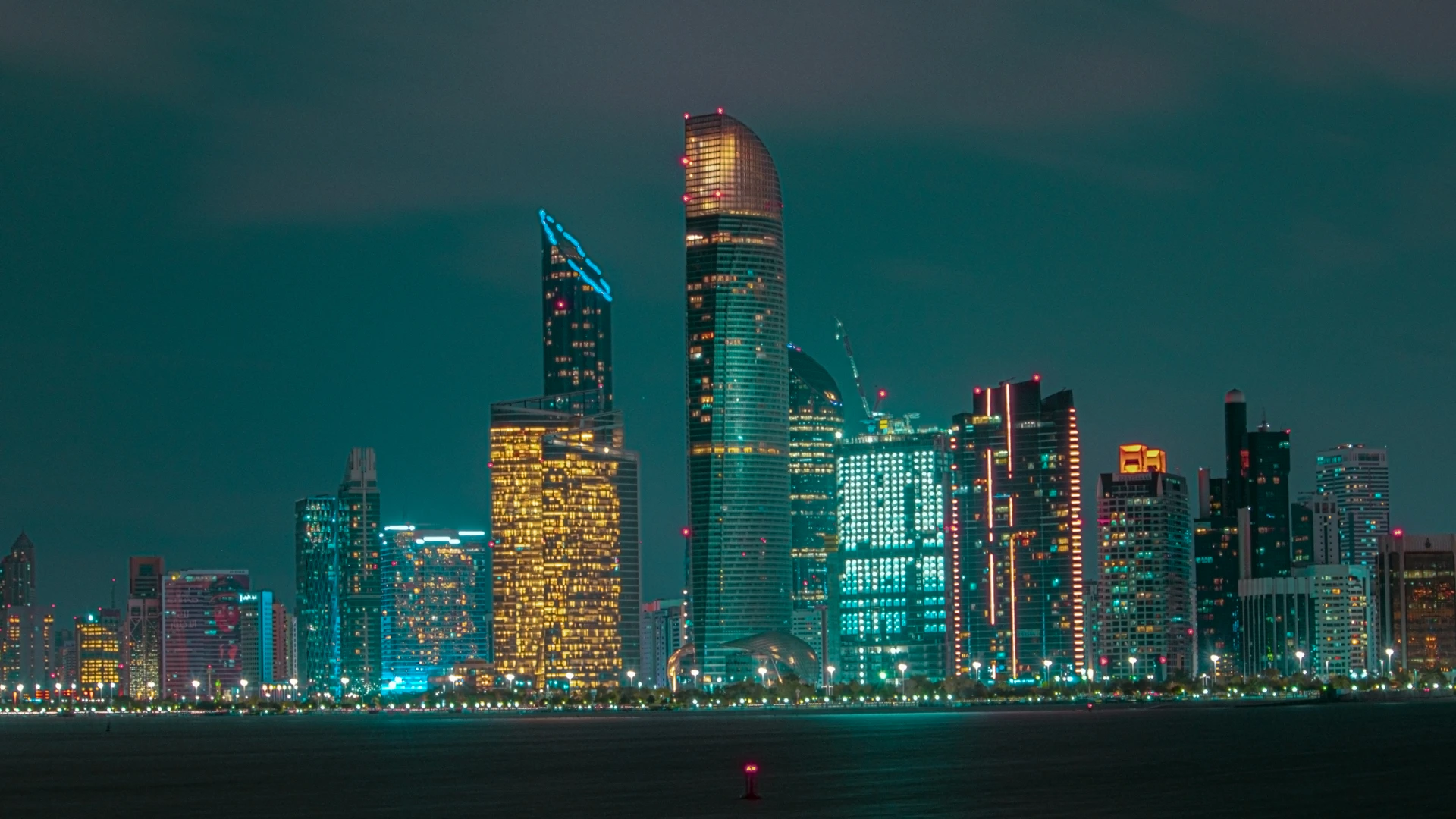 Abu Dhabi towers lit at night