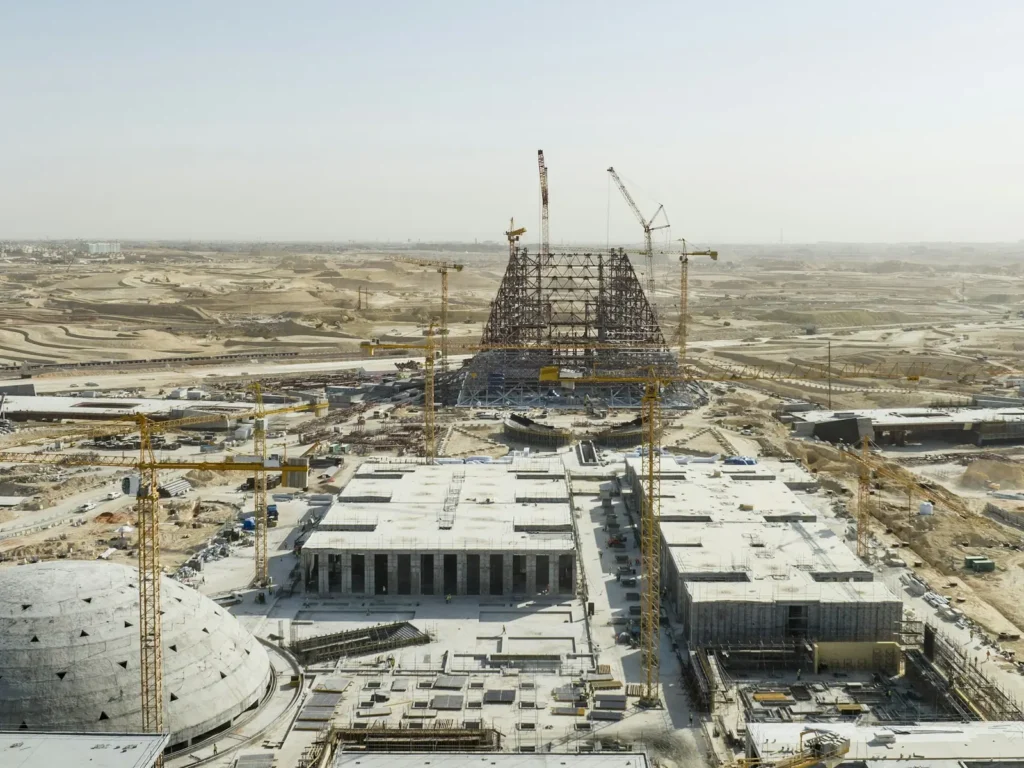 A large development under construction in the desert, seen from the air