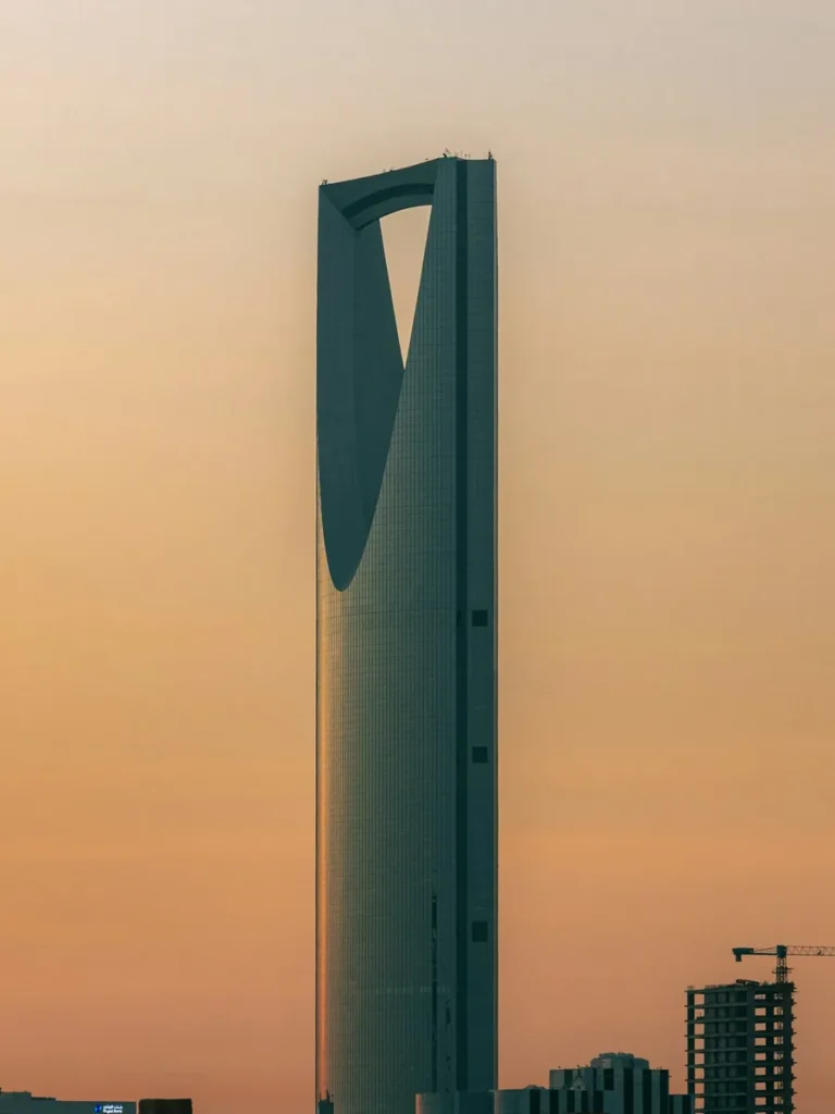 The Kingdom Centre tower above the Riyadh skyline at dusk